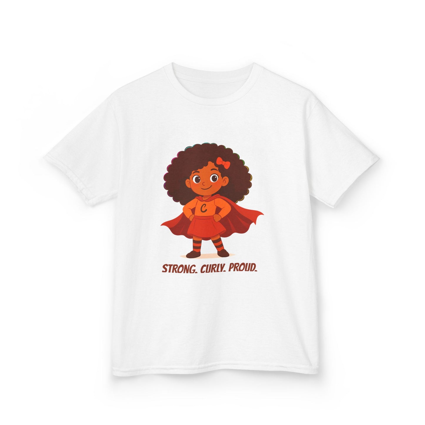 White t-shirt with a curly-haired superhero girl illustration and the text “Strong. Curly. Proud.”