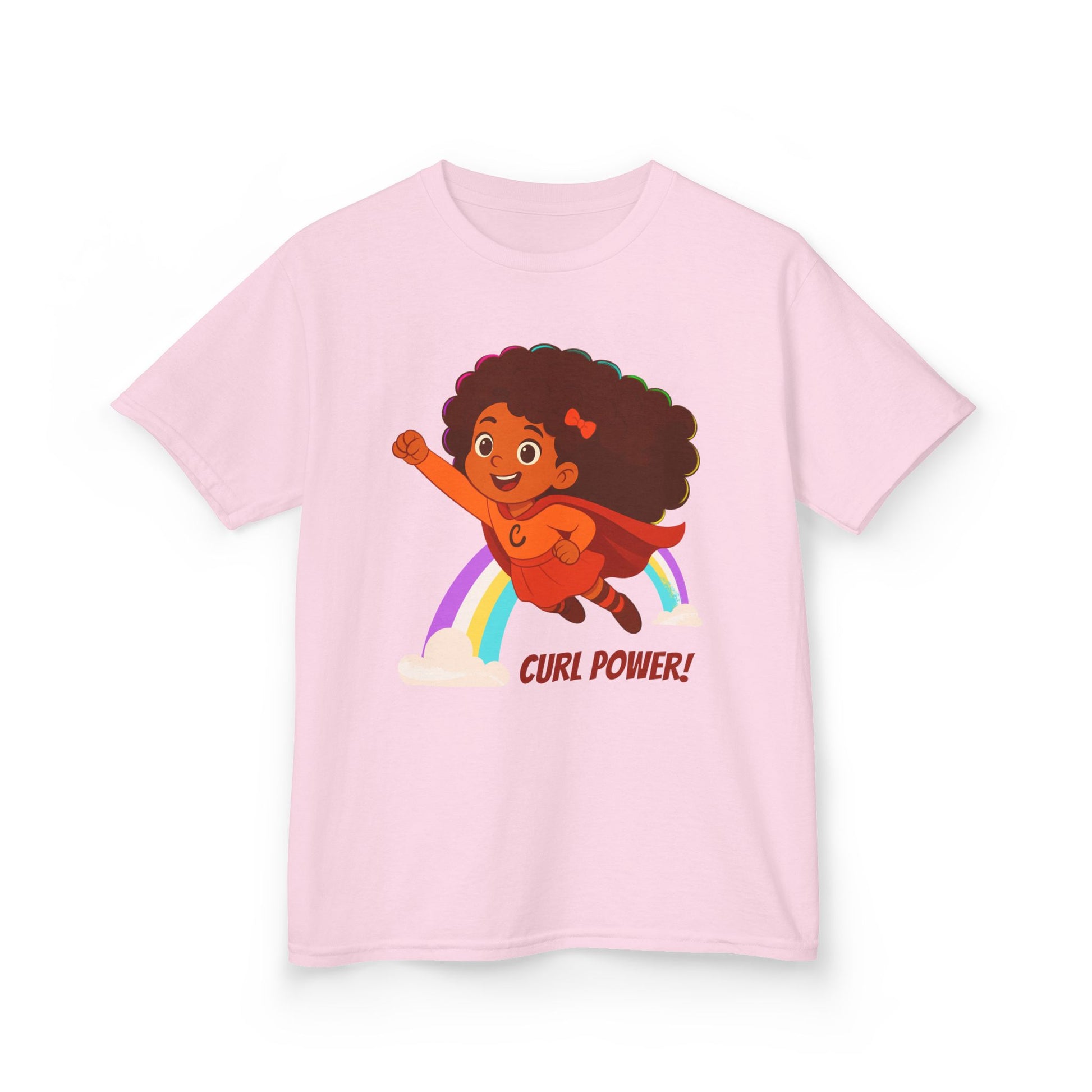 Light pink t-shirt with a curly-haired superhero girl illustration flying over a rainbow and the text “Curl Power!”.