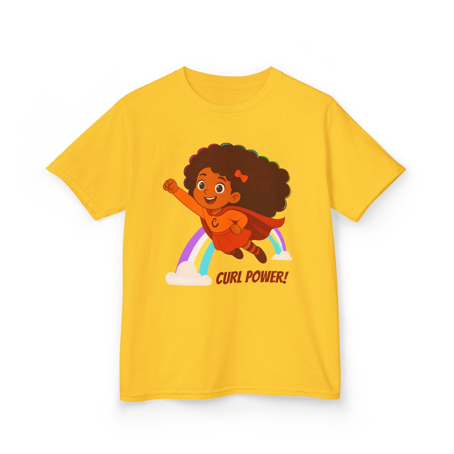 Yellow t-shirt with a curly-haired superhero girl illustration flying over a rainbow and the text “Curl Power!”.