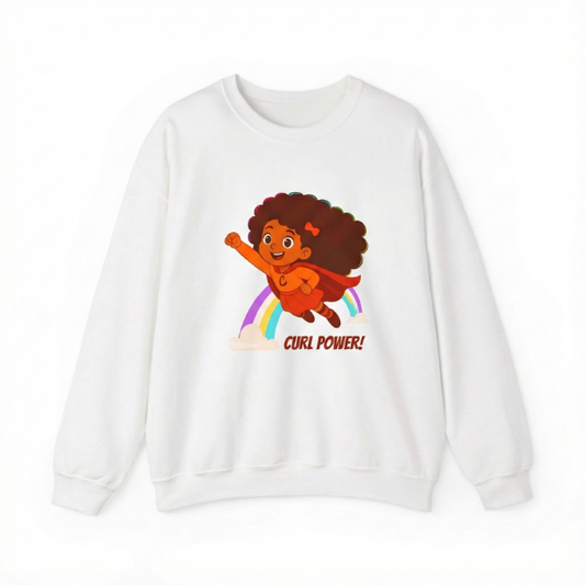 White kids’ crewneck sweatshirt featuring the “Curl Power” graphic of a curly-haired superhero girl flying over a rainbow.