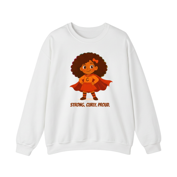 White kids’ crewneck sweatshirt with “Strong. Curly. Proud.” superhero curly-hair graphic — empowering design by Curlability.